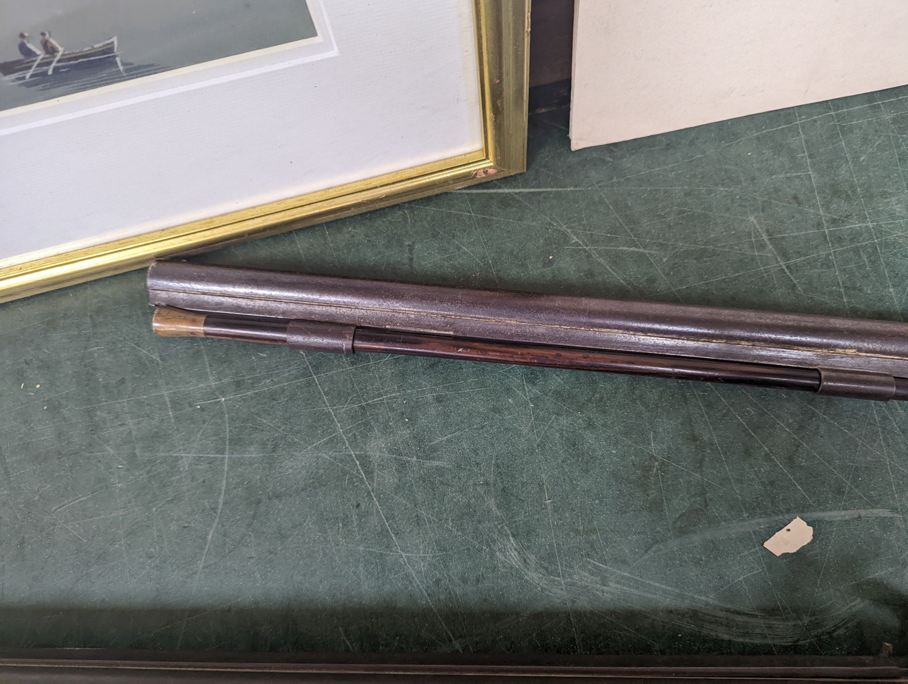 Two 19th century percussion muskets, 103cm. max., one double-barrelled